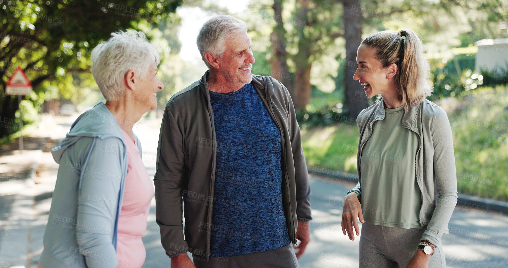 Buy stock photo Senior, happy couple and fitness with personal trainer in nature for funny workout or exercise. Elderly, man or woman with coach or laughing together for outdoor training, health or wellness in road