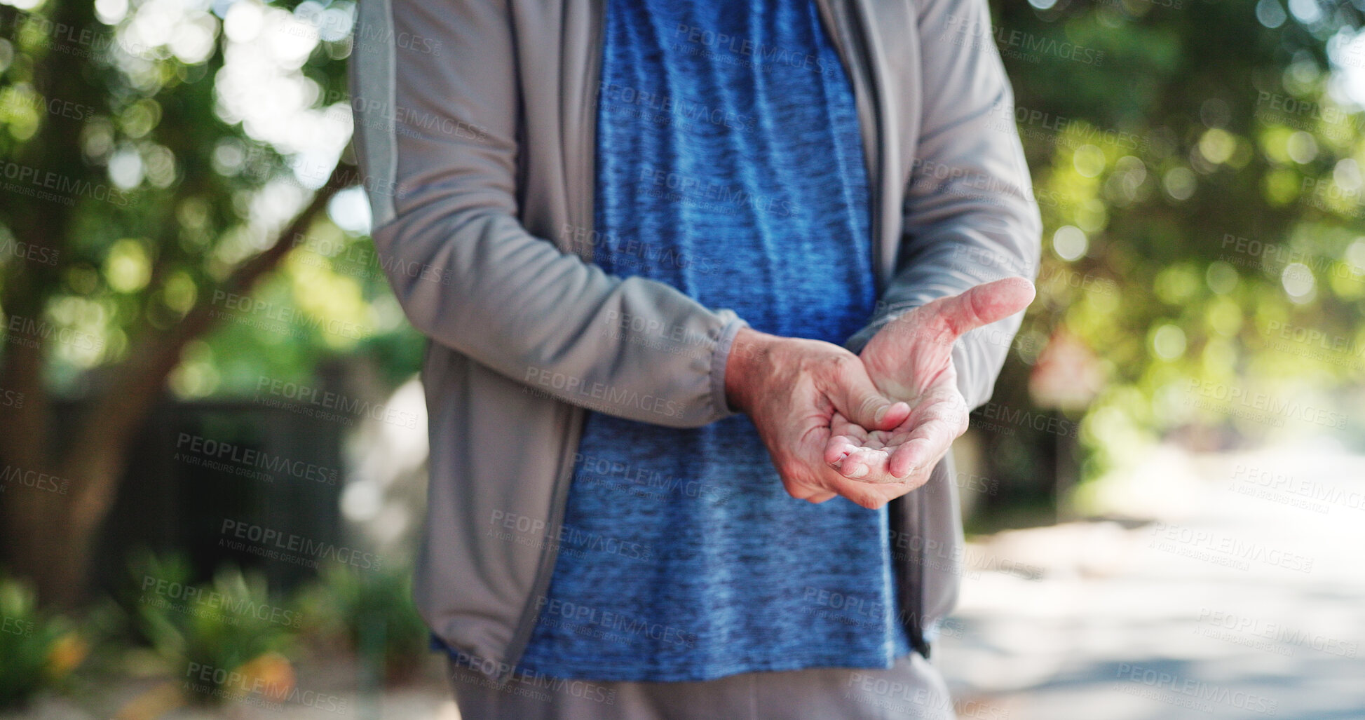Buy stock photo Senior man, hands and wrist pain with injury in nature for carpal tunnel syndrome in road. Closeup, elderly or male person with sore arm or fibromyalgia for joint inflammation or muscle tension