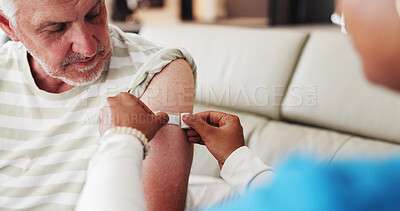 Buy stock photo Caregiver, old man and arm in nursing home with bandage for flu vaccine, healthcare or wellness. Nurse, elderly person or help with plaster for immunity shot, medical safety or protection from virus.