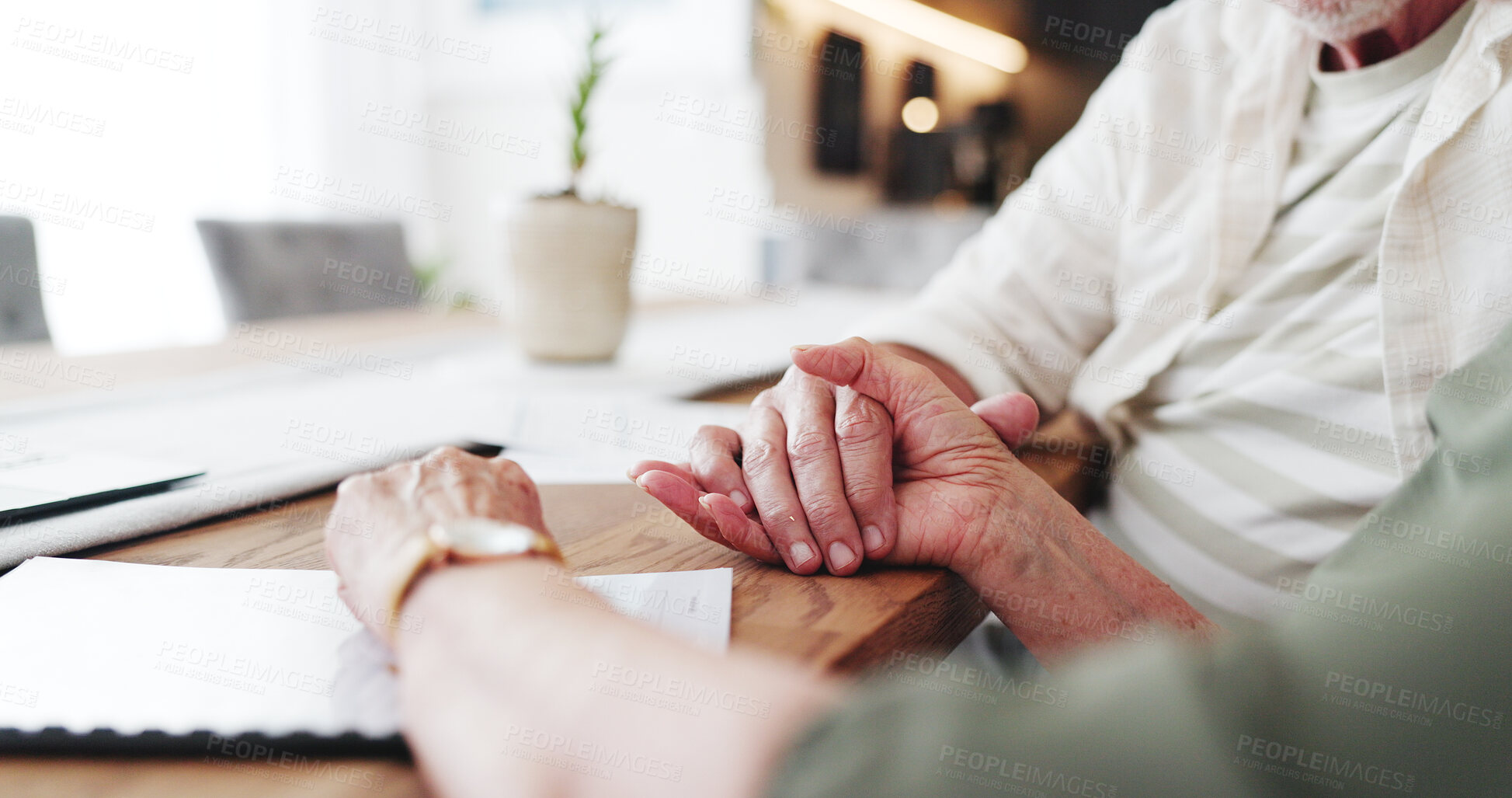 Buy stock photo Holding hand, paperwork and senior couple in house with application for retirement home together. Love, compassion and elderly people for will documents with marriage, support and care in apartment.