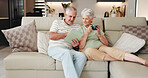 Coffee, relax and tablet with old couple on sofa in living room of home together for streaming. App, conversation and break with happy senior people drinking beverage in apartment for entertainment 