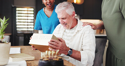 Buy stock photo Senior, happy man and birthday with box for gift, celebration or present in retirement home. Elderly, male person or caregiver with smile, cake or assisted living for surprise or anniversary date
