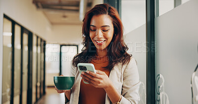 Buy stock photo Phone, coffee and texting with business woman in office for communication, schedule and planning. Connection, herbal drink and networking with person in creative agency for research and chat