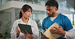 Tablet, support and nurse with doctor in hospital lobby for advice with surgery, medicine or treatment plan. Teamwork, woman and man with information, document and report for healthcare professional