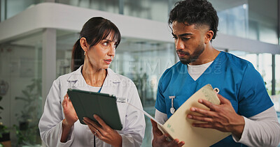 Buy stock photo Tablet, support and nurse with doctor in hospital lobby for advice with surgery, medicine or treatment plan. Teamwork, woman and man with information, document and report for healthcare professional