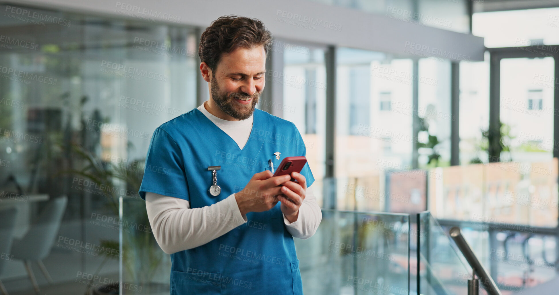 Buy stock photo Cellphone, man and nurse in hospital with typing for texting, communication or email for telehealth. Happy, technology and male healthcare worker with phone for contact, networking or medical support