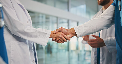 Buy stock photo Handshake, partnership and doctors in hospital for agreement, support or medical deal together. Shaking hands, greeting and healthcare employees with welcome, collaboration or teamwork in clinic.