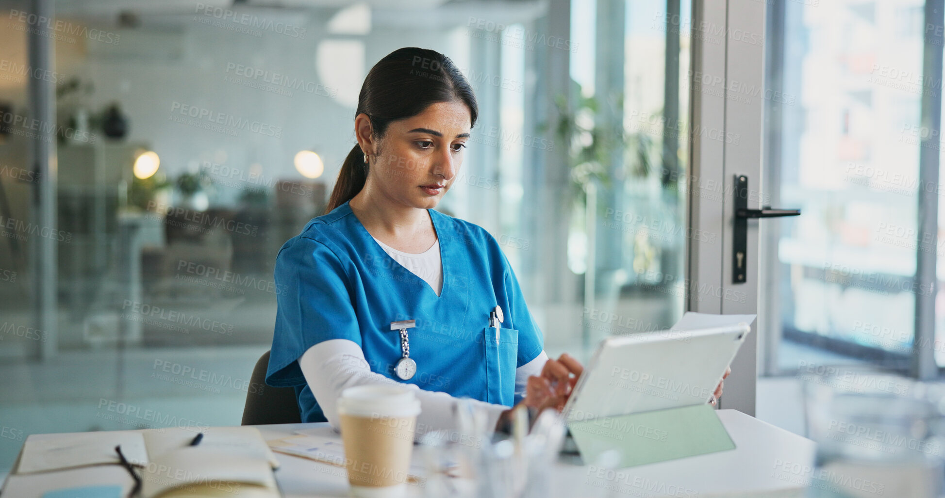Buy stock photo Nurse, woman or typing on tablet in clinic for medical case review, treatment plan or telehealth app. Healthcare, female professional and tech for surgery schedule, health update or hospital database