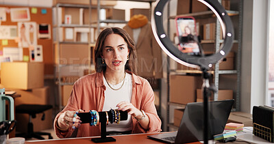 Buy stock photo Jewelry, influencer and promotion with woman in warehouse for startup, ecommerce and chat. Content creation, online shopping ambassador and live stream with person and accessory for broadcast 