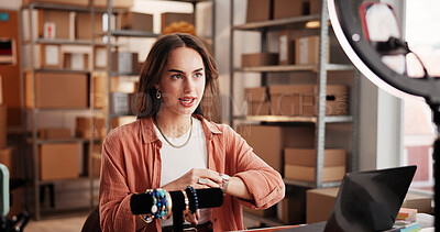 Buy stock photo Jewelry, live stream and ecommerce with woman in warehouse for startup promotion and chat. Content creation, online shopping ambassador and influencer with person and accessory for broadcast 