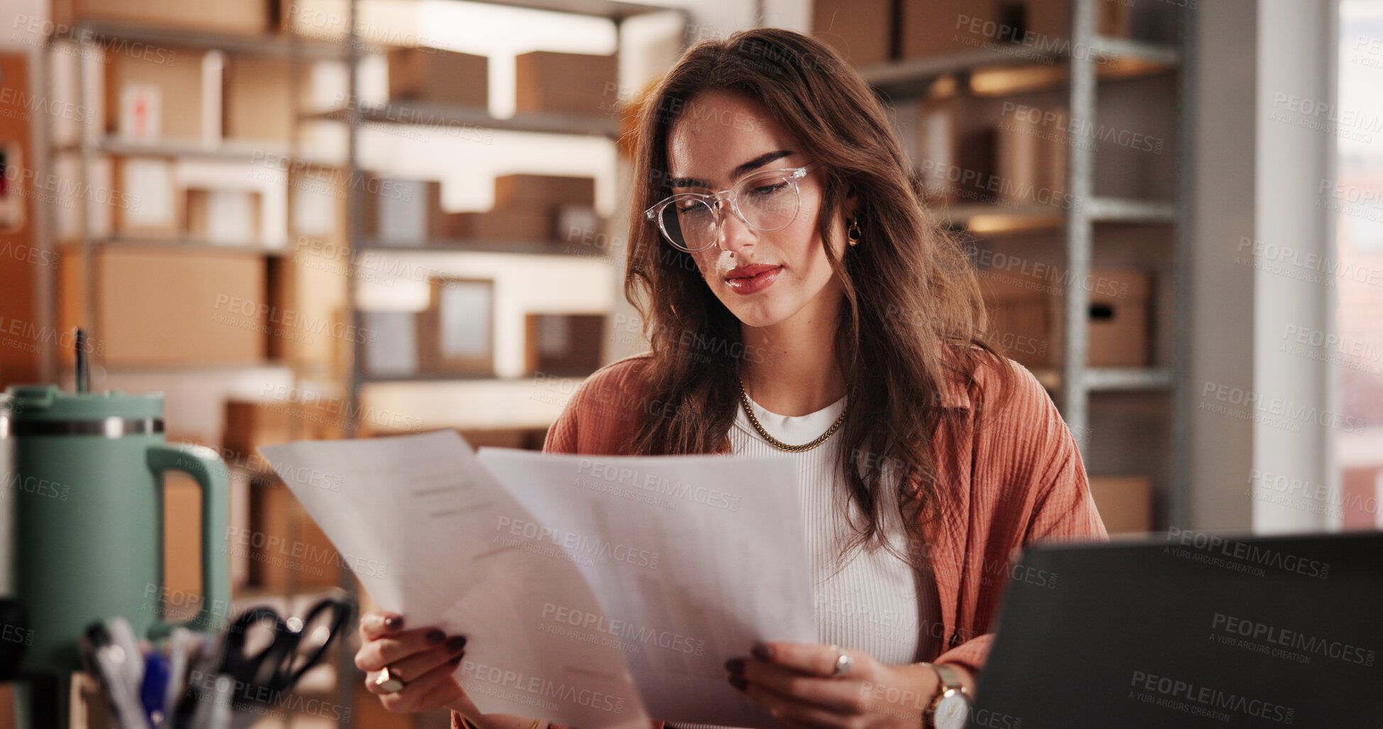 Buy stock photo Supply chain, documents and woman with laptop, reading and ecommerce with info. Person, shipping schedule and entrepreneur with paperwork, inventory and checklist for delivery bill or business owner