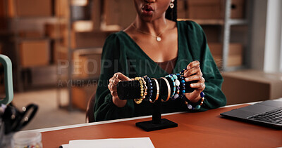 Buy stock photo Online, vlog and hands with bracelets, small business and product promotion on social media and web. Influencer marketing, live streaming and person with jewelry, talk and ecommerce in warehouse
