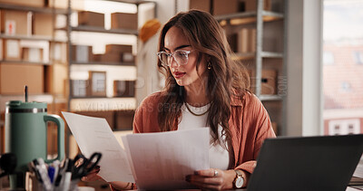 Buy stock photo Ecommerce, documents or woman with laptop, small business or shipping schedule. Person, reading or entrepreneur with paperwork, inventory or checklist for online order, supply chain or delivery bills