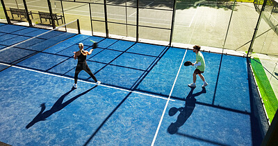 Buy stock photo Padel, athletes and people at court, cardio and training for sport tournament, above and performance. Outdoor, fitness and tennis players with rackets for challenge, competition and practice together
