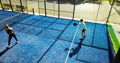 Buy stock photo Padel, athletes and people at court, training and cardio for sport tournament, above and performance. Outdoor, fitness and tennis players with rackets for challenge, competition and practice together