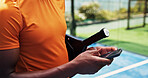 Hands, phone and scroll at tennis court for exercise, contact and racket for padel game at urban park. Person, smartphone and texting with mobile app, gear and outdoor for fitness at sports club