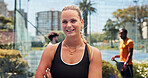 Portrait, fitness and woman by court for tennis competition practice, sports and training start. Active, female person outdoor and smile with exercise confidence, wellness or ready for padel workout.