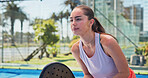 Sports, padel and woman on court ready for exercise, training and practice for competition. Tennis, athlete and person with racket for playing game, match and tournament for challenge outdoor