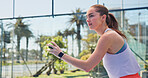 Sports, padel and woman on court with ball ready for exercise, training and practice for competition. Tennis, athlete and person with serve for playing game, match and tournament for fitness outdoor