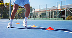 Tennis court, exercise and legs with cone for training, agile practice and sports drill for fitness. Coordination workout, speed development and woman with footwork performance, outdoor and equipment