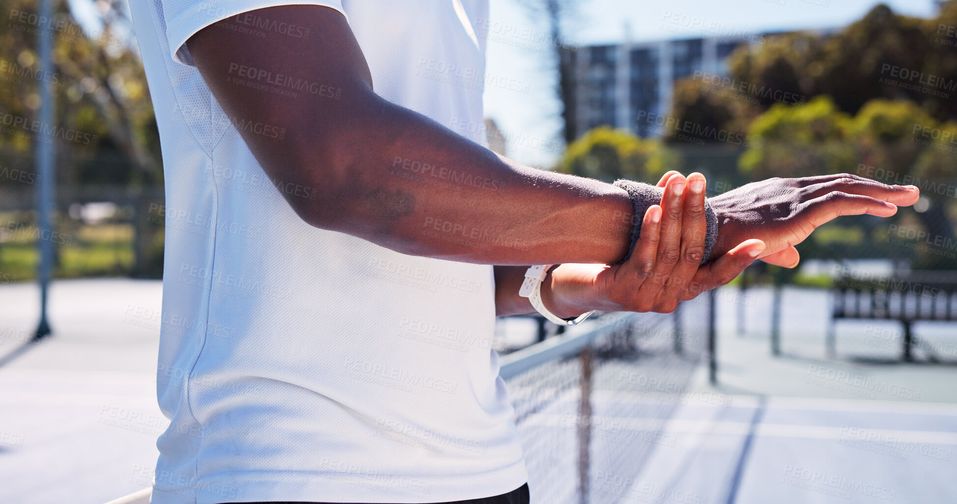 Buy stock photo Hands, person and ache with wrist pain on tennis court for fitness, sports injury and inflammation. Player, discomfort and joint tension of training mistake, exercise accident and muscle fibromyalgia