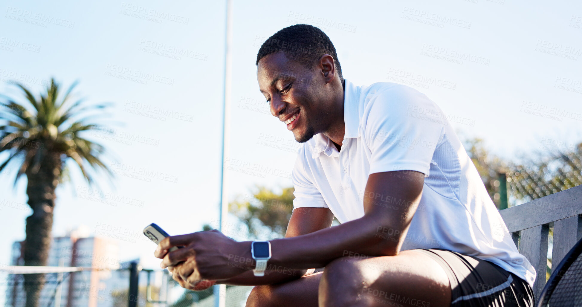 Buy stock photo Fitness, phone and black man on bench with smile, message update or exercise post on social media. Digital, reading or athlete outdoor with mobile, wellness chat or virtual tutorial on training break