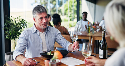 Buy stock photo Conversation, couple and wine with man in restaurant together for bonding or relationship. Date, drink and romance with mature person at table in coffee shop for break, connection or hospitality
