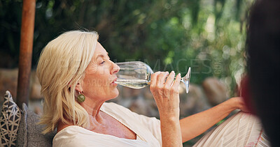 Buy stock photo Alcohol, break and glass with woman outdoor at wine farm for getaway or tasting experience. Drinking, relax and thinking with mature person at garden venue for summer holiday, vacation or wellness