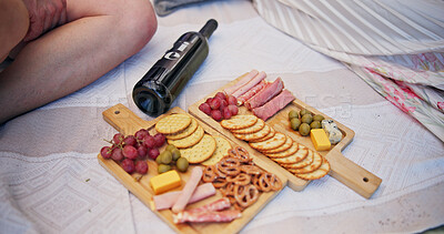 Buy stock photo Couple, people and charcuterie board with wine for picnic, date and bonding together with healthy snack. Partner, relax and meat or cheese platter with alcohol for drink, commitment and connection