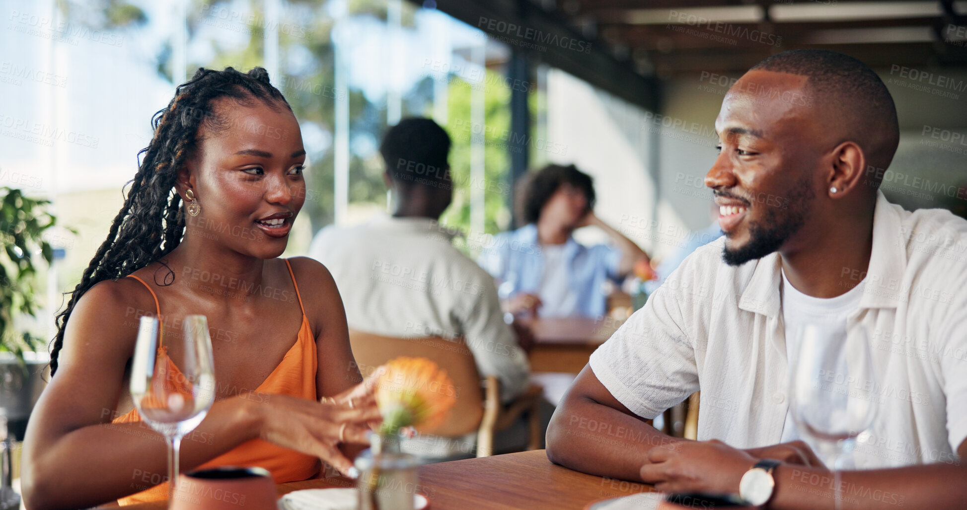 Buy stock photo Conversation, date and love with couple in restaurant together for bonding or relationship. Relax, romance and talking with happy people at table in coffee shop for break, connection or hospitality