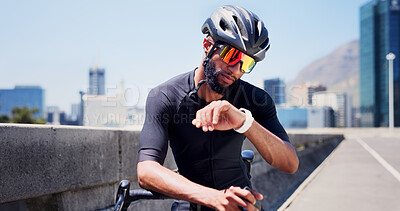 Buy stock photo Black man, smart watch and bike for fitness in city, sunglasses and helmet for training in street. African person, iot clock and stopwatch with bicycle, exercise and monitor for cardio in urban town