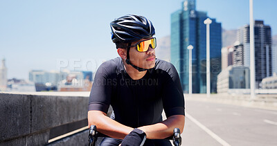 Buy stock photo Man, bicycle and thinking with fitness in city, space and reflection with sunglasses on urban bridge. Person, bike and helmet for training, perspective or break outdoor in road for exercise in town