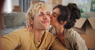 Buy stock photo Smile, couple and selfie with kiss at new house for photography, social media post and moving in. People, love and profile picture update for real estate, property investment and relocation memory