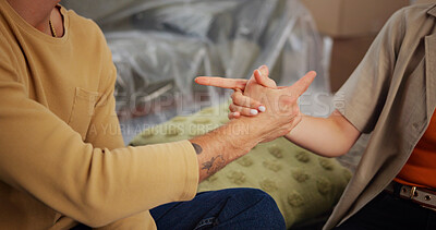 Buy stock photo Couple, handshake and moving in with boxes in new home for bonding, connection and celebration in property. People, shaking hands and relocation in lounge for love, real estate and investment