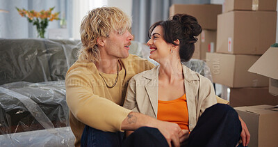 Buy stock photo Happy, laugh and couple in new home for moving to house, property mortgage and rental apartment. Marriage, relationship and man with woman relax for bonding, love and talking for real estate purchase