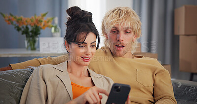 Buy stock photo Couple, moving and shocked with smartphone, new home and furniture shopping on website and browsing. Surprised, man and woman with mobile for discount deal on app, scroll or plan for house renovation