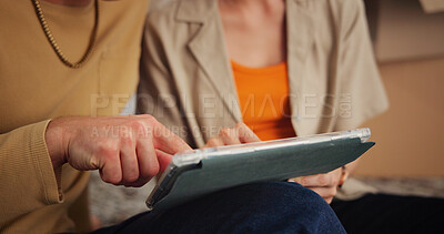 Buy stock photo Tablet, scrolling and hands of couple in house with relax for communication, social media or contact. Digital technology, bonding and man with woman for texting, connectivity or research on app.