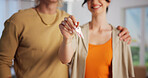 Happy couple, hands and new home with keys for mortgage, property purchase or investment together. Man, woman or homeowners with smile or loan for moving in, buying or real estate finance in house