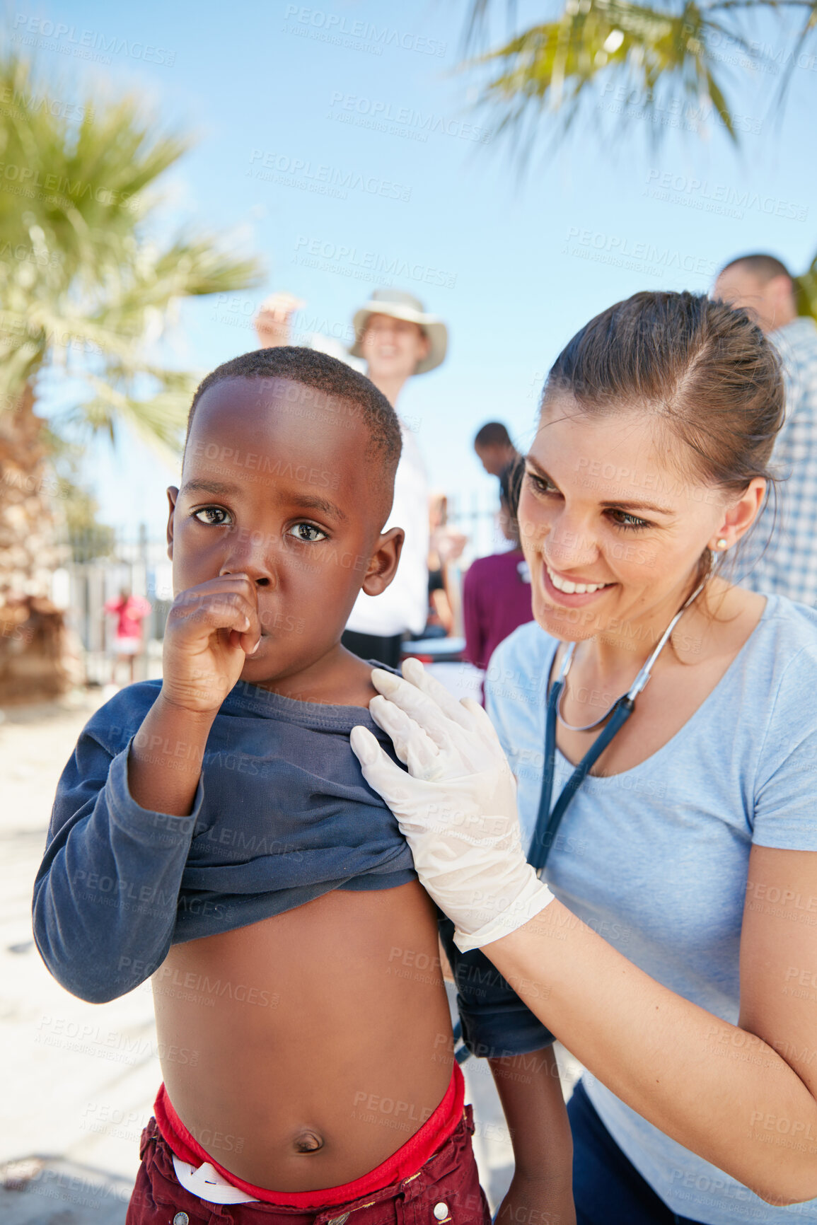 Buy stock photo Volunteer, help and doctor with child for outreach, humanitarian aid and medical support outdoor. Healthcare, portrait and woman with kids for consulting, check up and stethoscope for wellness
