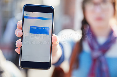 Buy stock photo Hand, phone screen and cyber bullying at college with text message, stalker or notification at campus. Person, smartphone and rude chat with harassment, mobile app and social network at university
