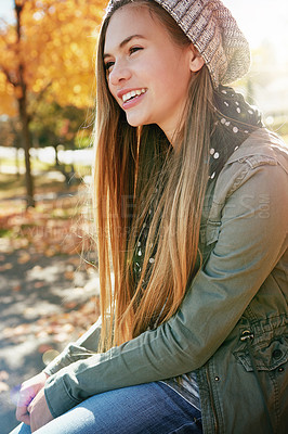 Buy stock photo Teenager, girl and smile in park with autumn fashion, school holiday and contemplation on weekend. Happy, child outdoor and thinking with fall clothes, stylish apparel and trendy style for vacation.