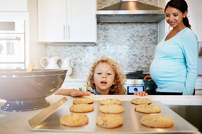 Buy stock photo Kitchen, child and pregnant woman with cookies for baking, smile and bonding in home. Pregnancy, maternity and mother with son for biscuits, help and excited for sweet treat or dessert in house