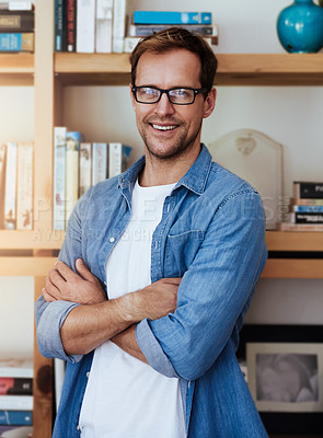 Buy stock photo Arms crossed, smile and portrait of man and books for author, publishing agent and about us. Professional writer, journalist and glasses with male person in media agency for editor and confidence