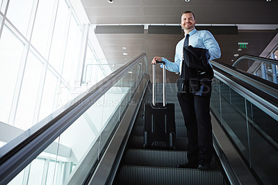 Buy stock photo Thinking, escalator and happy man with luggage, investor and vision for future investment. Professional, financial advisor and person with baggage, low angle and global trading opportunity with ideas