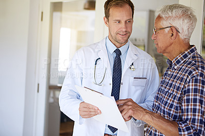 Buy stock photo Clipboard, consultation and doctor with elderly man in clinic for discussion on medical diagnosis. Checklist, checkup and healthcare worker with senior male patient for treatment planning in hospital