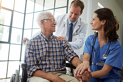 Buy stock photo Doctor, nurse and old man in wheelchair for healing, healthcare or medical consulting. Conversation, recovery and smile of senior person with disability in hospital for advice or rehabilitation