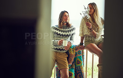 Buy stock photo Couple, relax and people with coffee, balcony or romance with flowers on break, bonding and together. Home, man and woman with floral gift, love and beverage on weekend, morning and relationship