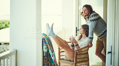 Buy stock photo Balcony, chair and couple with coffee in home for bonding, relax and chill on weekend getaway. Morning, dating and man with woman with drink on patio for holiday, vacation and anniversary at lodge