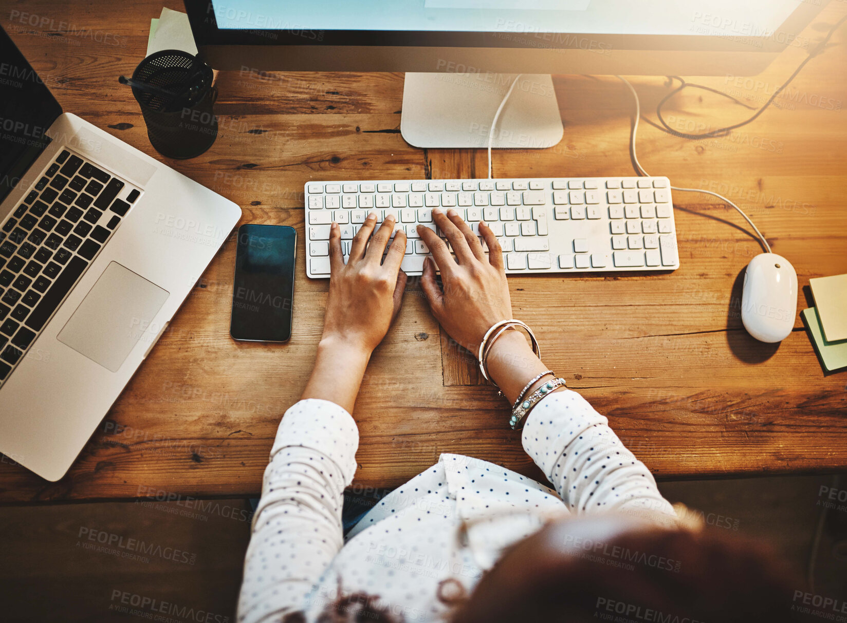 Buy stock photo Above, business and woman with computer, hands and typing with deadline, internet and connection. Closeup, person and evening with journalist, researcher for article and report for story and review