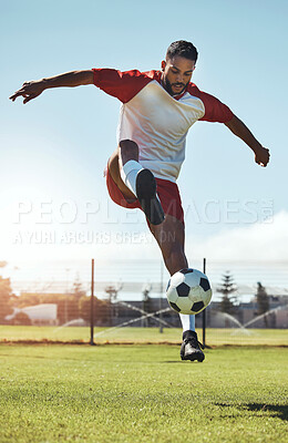 Buy stock photo Man, soccer and ball tricks in sports, fitness and exercise for training, workout or practice on the field in the outdoors. Athletic active soccer player in football sport trick, motivation or cardio